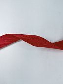 Лента тканная 25мм 148 красный 10,7г/м (полая) (100м)